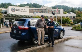 Veteran assisted from van outside Portland VA Medical Center - Transportation to the Portland VA Medical Center